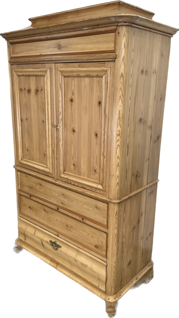 A charming solid antique Continental pine armoire
